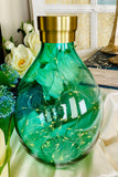 Green Vase with Gold Detailing
