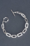 Handmade Sterling Polished and Pave Status Curb Link Bracelet