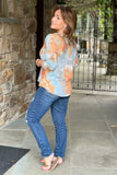 Mid Rise Distressed Relaxed Fit Jean