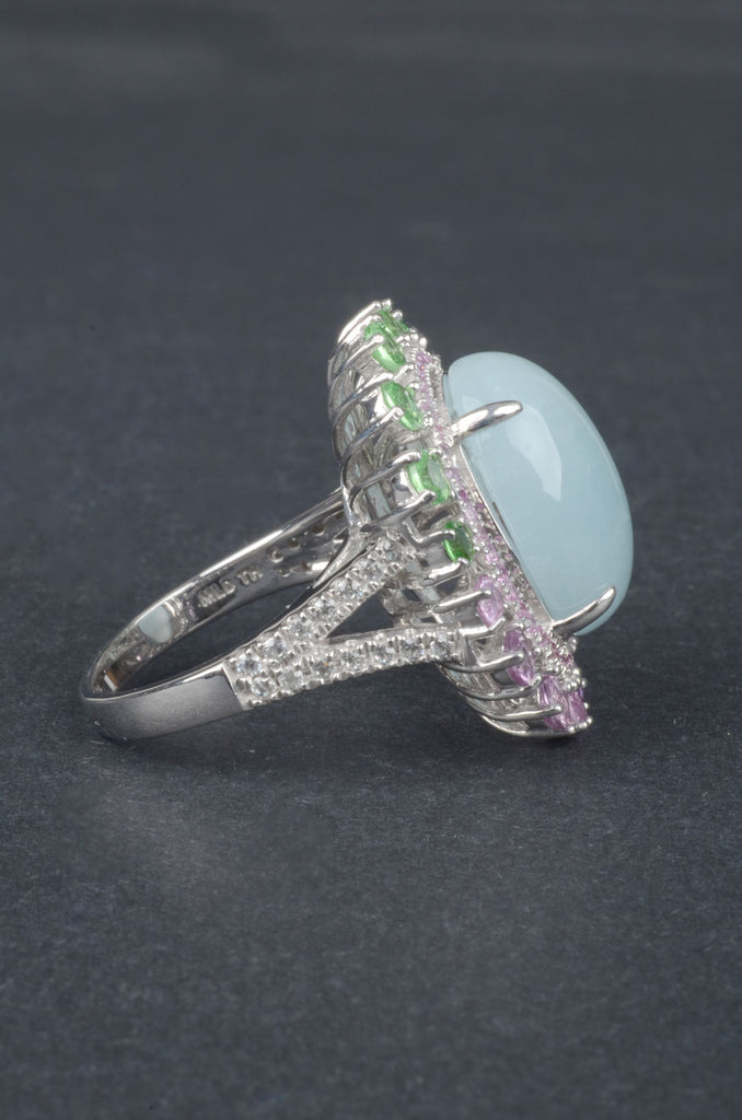 Oval Aquamarine Ring With Tsavorite, Pink Sapphire and White Zircon Border
